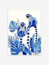 Blue monkey poster featuring two monkeys with white faces and striped tails among large blue tropical leaves and golden accents.