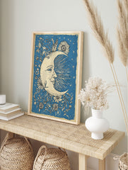 Blue Moon & Flowers Poster featuring a smiling crescent moon with a face, surrounded by floral vines and stars. - Image 4