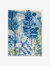 Blue ocean botanical poster with seaweed, jellyfish, coral and shell forms in indigo and cream