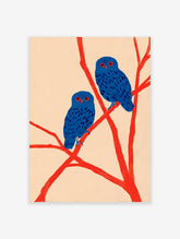 Two blue owls with red eyes perch on bright red branches against a light background, in a modern illustration wall art print.