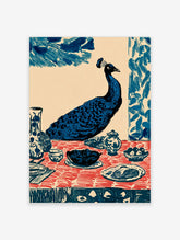 Illustrative blue peacock seated at a dining table with red patterned tablecloth and ceramic dishes art print