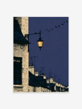Blue rooftop poster with illuminated lantern, stone chimney stacks, and birds in a deep indigo night sky