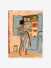 Woman in blue striped robe reaching into blue kitchen cupboard, modern interior poster