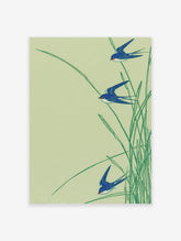 Japanese-style art print featuring three blue swallows flying through green reeds on a light green background.