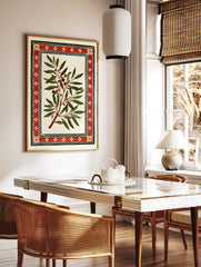 Botanical branch illustration with red berries and a geometric red border on a white background, in a styled room mockup