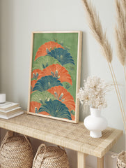 Illustrative botanical wall art with layered fan-like leaves in orange, blue, and green on a, in an alternate framed mockup