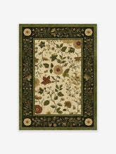 Traditional green and beige botanical floral area rug with intricate vine and flower patterns and a solid green border.