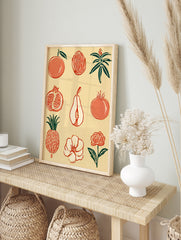 Botanical fruit and flower grid illustration with pomegranates and pineapples in orange and, in an alternate framed mockup