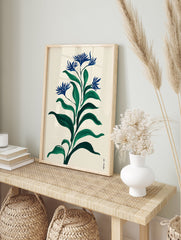 Modern botanical wall art print with deep blue flowers and dark green leaves on a light beige background in an illustrative style. - Image 3