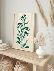 Botanical wall art print featuring dark blue flowers and green leaves on a light cream background, in an illustrative style. - Image 3