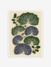 Botanical wall art print with stylized dark green and blue fan-like leaves, white veins, and green branches on a cream background.