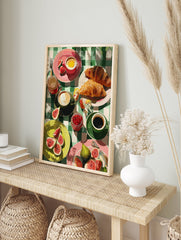 Vibrant breakfast wall art illustration with croissants, figs, coffee, egg, and jam on a green checkered tablecloth. - Image 3