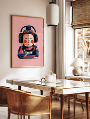 Painterly illustration of a Buddha figure wearing black headphones against a solid pink background, in a styled room mockup
