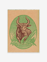 Vintage bull illustration wall art print with green oval background and brown bull on textured paper
