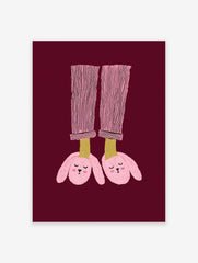 Illustration of feet in pink striped pajamas and pink bunny slippers on a maroon background. Bunny Slippers Wall Art.