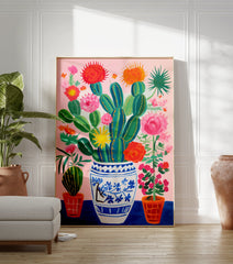 Vibrant cactus and flowers poster in a blue and white vase with pink background and orange pots. - Image 3
