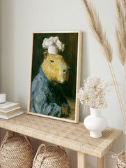Oil painting style print of a capybara wearing a chef's hat and blue uniform against a dark, in an alternate framed mockup