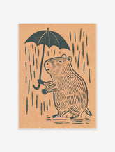 Capybara holding umbrella in rain, linocut style black illustration on peach background