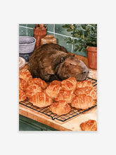 Watercolour illustration of a capybara sleeping peacefully on a wire rack of fresh croissants in a kitchen setting