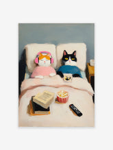 Oil painting of two cats in bed, one orange with pink headphones, one black and white with a remote, popcorn and books nearby. Cat Art.