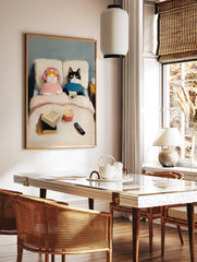 Oil painting of two cats in bed, one orange with pink headphones, one black and white with a remote, popcorn and books nearby. Cat Art. - Image 2