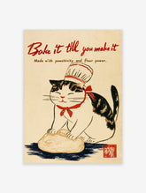 Cat in chef hat kneading dough under red Bake it till you make it text on cream background