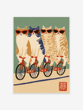 Four cats in sunglasses riding red bicycles in a row, retro cat print