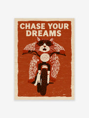 Illustration of a cat wearing goggles on a motorcycle with the text Chase Your Dreams on a textured red-orange background