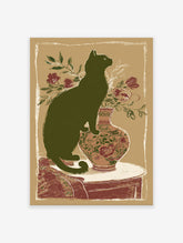 Vintage cat wall art print with a dark green cat sitting on a floral vase with red flowers and green leaves on an earth-tone background.