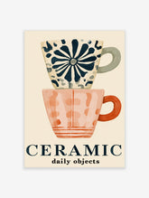 Ceramic mugs poster with stacked blue and pink cups, floral pattern, and CERAMIC typography on cream background