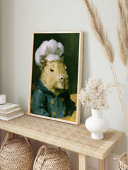 Painterly capybara portrait wearing a white chef hat and blue jacket, animal wall art print, in an alternate framed mockup