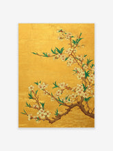 White and pink cherry blossom flowers on brown branches with green leaves against a gold background