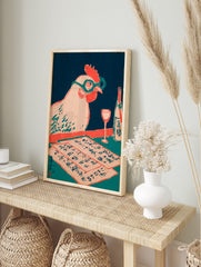 Illustrative woodcut print of a chicken with glasses, Japanese script papers, wine glass, and, in an alternate framed mockup