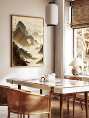 Traditional Chinese ink wash painting of layered mountains, misty clouds, flying birds, red trees, in a styled room mockup