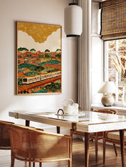 Vibrant cityscape train wall art illustration with buildings, green hills, trees, and a white train on elevated tracks. - Image 2