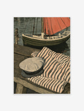 Coastal boat poster with green hull, red sail, striped cushion and white cap on wooden jetty