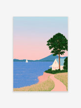 Minimalist coastal landscape art print featuring a white house on a cliff, a sailboat, mountains, and a soft pink sky