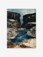 Coastal inlet landscape with dark craggy cliffs framing deep blue water and a painterly sky in a vertical wall art print