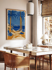 Coastal landscape poster with blue palm trees, orange trunks, white hammocks, a blue sea, and a distant town. - Image 2