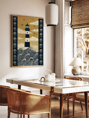 Illustrative print of a striped lighthouse in dark blue and golden-beige, with crashing waves, in a styled room mockup