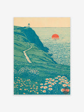 Coastal wall art print with lighthouse on green cliff, winding path, red sun over sea, and daisies in foreground