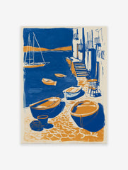 Coastal village poster showing blue and orange boats in a harbor with buildings, steps, and a sailboat.