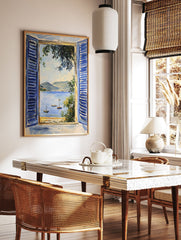 Coastal Window View Poster showing a blue shuttered window opening to a seascape with boats and mountains. - Image 2