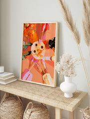 Top-down illustrative art print of a table with coffee and oranges surrounded by four people, in an alternate framed mockup