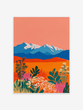 Colorful landscape wall art showing blue mountains with snow, an orange desert, and vibrant pink, green, and white flowers in foreground.