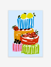 Illustrative stack of colourful cakes with strawberries, berries, and lemons on a light blue background wall art print