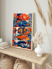 Five colourful illustrative fish in blue and orange hues against patterned tiles, marine life, in an alternate framed mockup