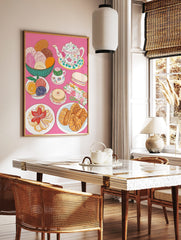 Colourful illustrative print of Mexican conchas, floral teapot, teacup, croissants, and pastries on, in a styled room mockup