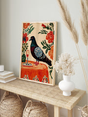 Painterly pigeon with blue wings on an orange table with wine glass and flowers, in an alternate framed mockup