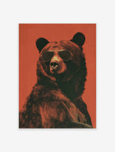 Cool bear poster wearing aviator sunglasses against a textured red background, showcasing dark fur and a stern expression.